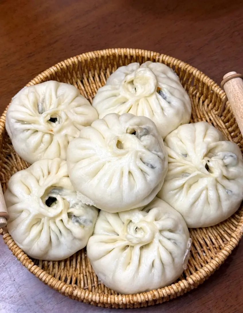 素什錦菜包蒸籠近景示意