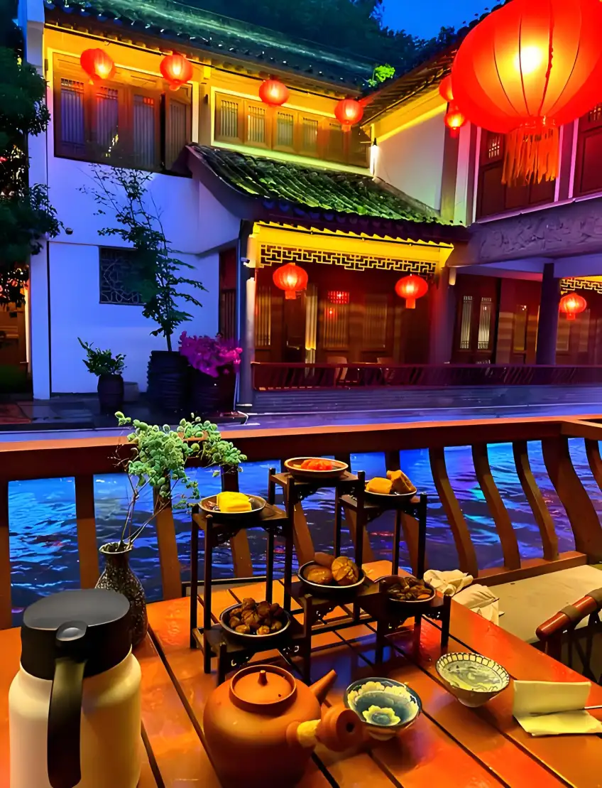 臨河民宿陽臺茶席夜景豎圖